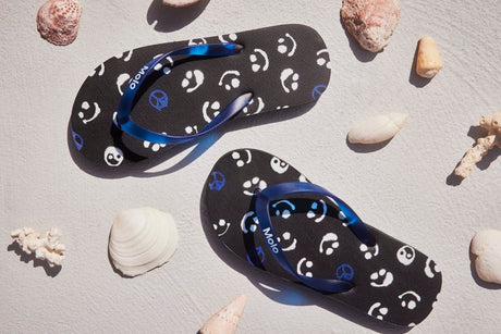 Zeppo- Blue signs Flip Flops